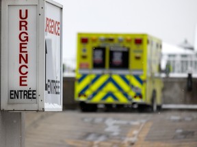 One of 5 ambulances parked at the emergency room at the Notre-Dame Hospital in Montreal, on Thursday, January 13, 2022.