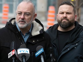 Ensemble Montreal leader Aref Salem, centre, with Julien Henault-Ratelle, left, and Benoit Langevin speak to reporters on the plight of the Village and the solution they see, during press conference on Thursday March 16, 2023.