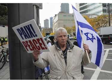 A man attends a rally in Montreal on Sunday, Oct. 29, 2023 organized by Federation CJA that called for the release of hostages being held by Hamas and other groups in Gaza.