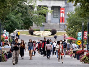 Students are seen walking outside McGill University in Montreal.