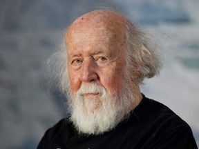 Hubert Reeves poses for a photo