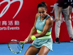 Leylah Fernandez of Laval hits a return against Czechoslovakia's Katerina Siniakova during their women's single final match on the seventh day of the Prudential Hong Kong Tennis Open in Hong Kong on Sunday, Oct. 15, 2023.