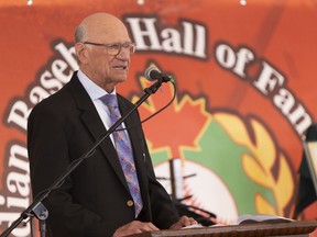Jacques Doucet speaks at the 2023 Canadian Baseball Hall of Fame induction ceremony in June.