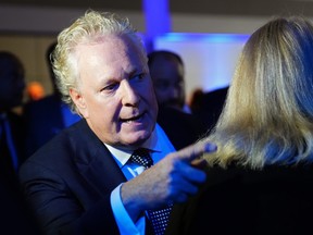 Jean Charest greets supporters at the Conservative Party of Canada leadership vote in Ottawa on Sept. 10, 2022. A longtime Liberal MNA for the Sherbrooke riding that serves Bishop's University, Charest excoriated the government of Premier François Legault on Saturday, Oct. 21, 2023, for forging ahead with a tuition hike for out-of-province students.