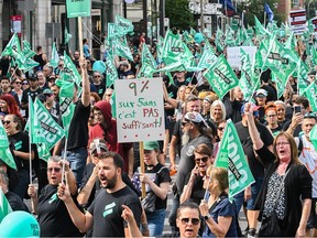 People take part in a public sector union demonstration in Montreal on Sept. 23, 2023.