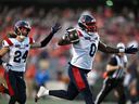 Alouettes defensive-end Shawn Lemon scores a touchdown after a fumble by Redblacks quarterback Dustin Crum last week. The defence will have to carry the load for Montreal to advance far in the playoffs, Herb Zurkowsky writes.
