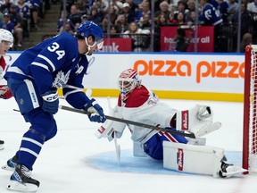 Canadiens goaltender Jake Allen makes a terrific glove save to rob Leafs' Auston Matthews of a sure goal Monday night.