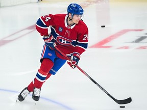 Canadiens prospect Lias Andersson is seen skating on Bell Centre ice before a pre-season game this year sporting Montreal's traditional red jersey.
