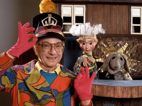 Ernie Coombs as Mr. Dressup, with puppets Casey and Finnegan.