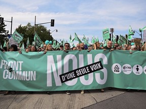 People take part in a public-sector union demonstration in Montreal on Sept. 23, 2023 Members of several Quebec public-sector unions are continuing to vote in favour of strike mandates by large margins.