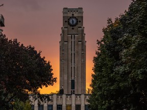 The sun sets behind the clock tower at Atwater Market.