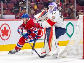 Montreal Canadiens' Tanner Pearson skates behind the net around Panthers' Sergei Bobrovsky