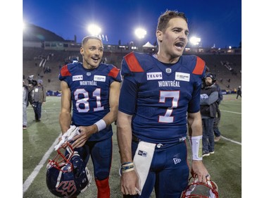 Alouettes reciever Austin Mack, left, and quarterback Cody Fajardo celebrate following Canadian Football League East Division semifinal playoff game against the Hamilton Tiger-Cats in Montreal on Saturday, Nov. 4, 2023.