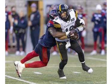Alouettes' Shawn Lemon sacks Hamilton Tiger-Cats quarterback Bo Levi Mitchell during second half of Canadian Football League East Division semifinal playoff game against the Hamilton Tiger-Cats in Montreal on Saturday, Nov. 4, 2023.