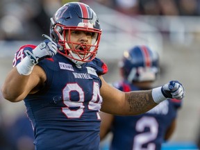 Alouettes defensive lineman Mustafa Johnson celebrates after making a tackle during at the East semifinal playoff game against the Hamilton Tiger-Cats in Montreal on Nov. 4, 2023.