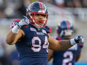 Alouettes defensive-lineman Mustafa Johnson is seen celebrating after making a tackle during East semifinal at Molson Stadium earlier this month.