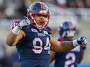 Alouettes defensive-lineman Mustafa Johnson celebrates after making a tackle during East semifinal at Molson Stadium earlier this month. Johnson is big part of Montreal's fearsome defence, Jack Todd writes.