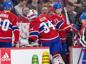 Jake Allen gets off the ice at the Canadiens bench