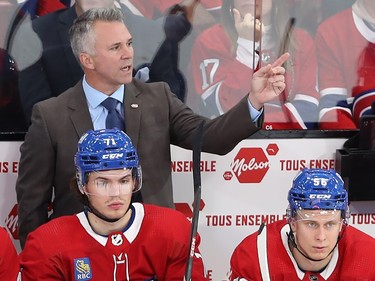 Canadiens coach Martin St-Louis gestures behind the bench