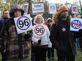 People attend a "No to Bill 96" Rally in the Notre-Dame-de-Grâce district of Montreal on Sunday, Nov. 19, 2023.