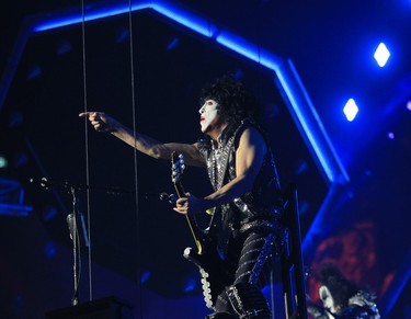 Paul Stanley of Kiss points to the crowd at the Bell Centre.