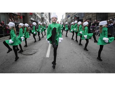 Ten-year-old Mackenzie Pearce leads the Costello Irish dancers, during the Montreal Santa Claus parade on Saturday, Nov. 25, 2023.