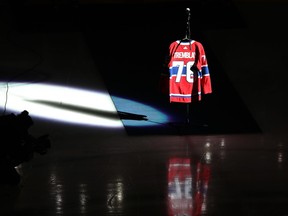 A Canadiens jersey with the number 76 and the name Tremblay on it is lit by a spotlight on the ice of the Bell Centre