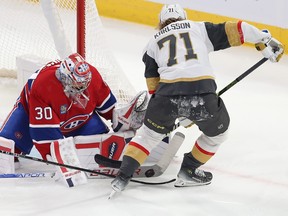 Montreal Canadiens goaltender Cayden Primeau stops the puck on Vegas Golden Knights' William Karlsson (71) during first period NHL action in Montreal on Thursday Nov. 16, 2023.