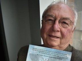 Ian Cobb, 79, is seen holding up his memoir.