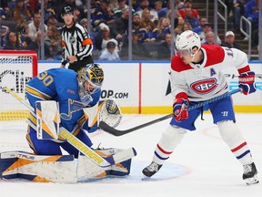 Blues goaltender Joel Hofer makes a save against Canadiens' Brendan Gallagher during the second period at Enterprise Center on Saturday, Nov. 4, 2023, in St. Louis.