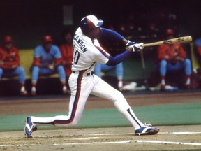 Andre Dawson's desire to have the cap on his Hall of Fame plaque changed from a Montreal Expos logo to a Chicago Cubs one was a "shot in the gut" for Expos Fest president Perry Giannias. Dawson takes a swing in this undated photo.THE CANADIAN PRESS/Staff