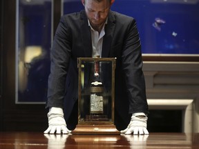 A view of a bottle of Macallan Adami 1926 whisky, on display during a media preview at Sotheby's auction house, in London, Oct. 19, 2023. A bottle of Scotch whisky billed as "the most sought-after" in the world sold on Saturday, Nov. 18, 2023, for almost 2.2 million pounds (US$2.7 million), an auction record for a bottle of wine or spirits. The Macallan Adami 1926 sold at Sotheby's in London, after a bidding war between would-be buyers on the phone and in the room.