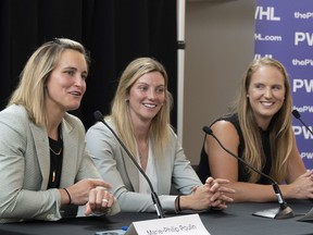 Canadian hockey star Marie-Philip Poulin says her dream is finally coming true. Canadian hockey players Poulin, left, Laura Stacey, centre, and Ann-Renee Desbiens, are introduced by the Professional Women's Hockey League as the first three players to sign free agent contracts with the league's Montreal franchise in Montreal, Thursday, Sept. 7, 2023.