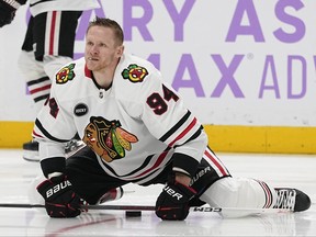 Chicago Blackhawks right wing Corey Perry warms up before an NHL hockey game against the Nashville Predators, Saturday, Nov. 18, 2023, in Nashville, Tenn.