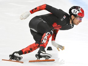 William Dandjinou of Montreal skates to a first-place finish during the 1,000-metre final at the ISU Four Continents Short Track Speedskating Championships in Laval on Sunday, Nov. 5, 2023.