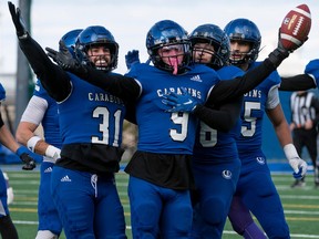 Montreal Carabins Louis-Philippe Gauthier (9) celebrates his interception during the first half of the 2023 Uteck Bowl against the Western Mustangs in Montreal on Saturday, Nov. 18, 2023.
