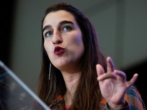 Emilise Lessard-Therrien speaks during a debate at the Québec solidaire party convention in Gatineau on Saturday, Nov. 25, 2023.