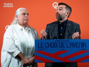 Québec Solidaire co-leaders Gabriel Nadeau-Dubois, right, and Manon Masse speak during a press conference at a party convention in Gatineau on Saturday, Nov. 25, 2023.