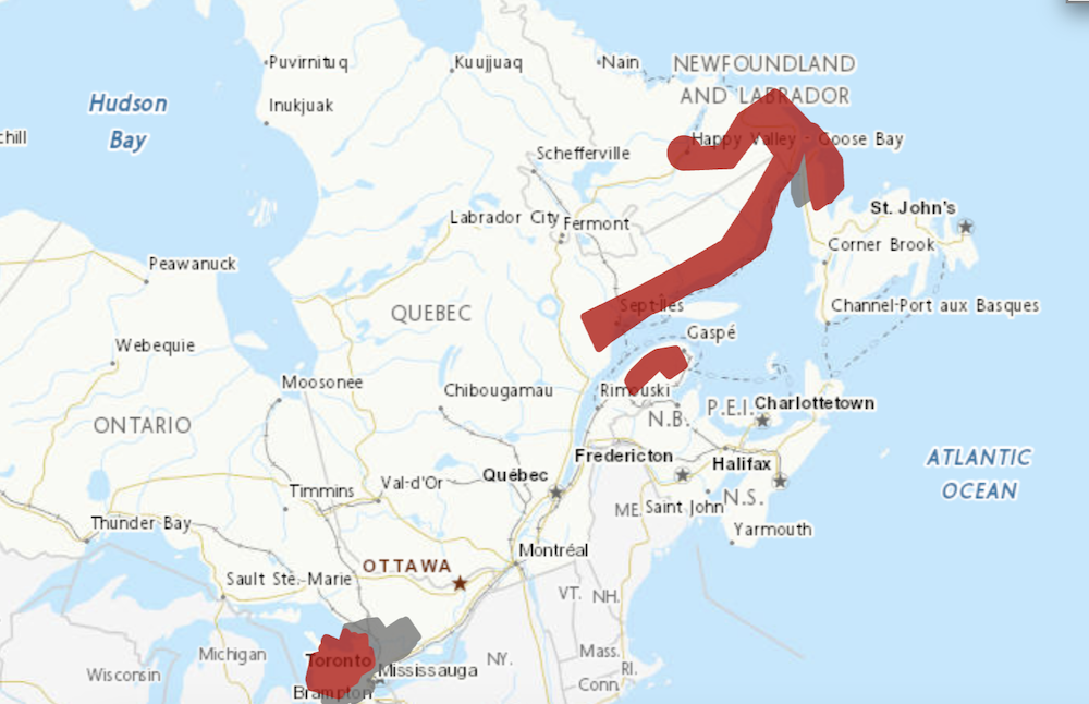 A map of Quebec with red weather warnings that look like an arrow pointing to the sea