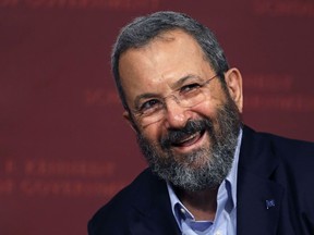 Former Israeli prime minister Ehud Barak smiles during a lecture at the John F. Kennedy School of Government, at Harvard University, in Cambridge, Mass., Wednesday, Sept. 21, 2016. Leaders from democratic nations -- including Barak, a former Israeli prime minister -- are gathering to discuss global conflicts during the annual Halifax International Security Forum.