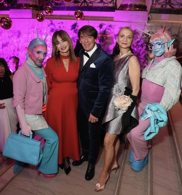 Whimsical animators pose with Otera Capital vice-president legal affairs Melanie Charbonneau, husband Yves Lalumière, president/CEO Tourisme Montréal, and Manuela Goya, Tourisme Montréal's vice-president, development of destination and public affairs, at the Montreal Museum of Fine Arts Ball on Saturday, November 18, 2023.