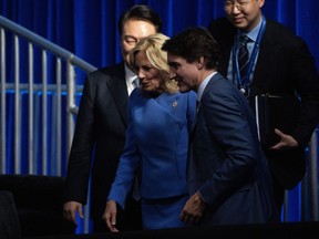 Prime Minister Justin Trudeau walks Jill Biden to her seat at the APEC welcome ceremony, Wednesday, Nov. 15, 2023 in San Francisco.