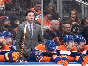 Edmonton Oilers head coach Jay Woodcroft watches the game unfold against the Nashville Predators during third-period NHL action in Edmonton on Saturday, Nov. 4, 2023.