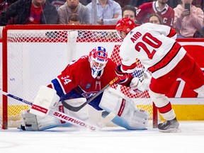 Canadiens Jake Allen stretches to make a save on a shootout attempt by Hurricanes' Sebastian Aho during game last season at the Bell Centre.