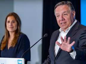 MONTREAL, QUE.: \July\ 5, 2022 -- Quebec Premier Francois Legault introduces Pascale Déry as the CAQ candidate in Repentigny, east of Montreal Tuesday July 5, 2022.