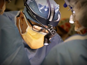 A surgeon operating in a Montreal hospital.