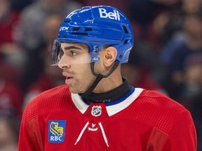 Canadiens' Jayden Struble is seen in a close-up wearing a neck guard.