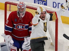 Golden Knights' Mark Stone raises his arms in celebration in front of Canadiens goaltender Cayden Primeau after scoring during a game last month at the Bell Centre.