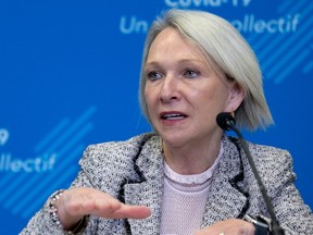 Sonia Bélanger gestures during a news conference