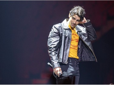 Joe Jonas performs with his brothers at the Bell Centre in Montreal on Friday, Dec. 1, 2023.